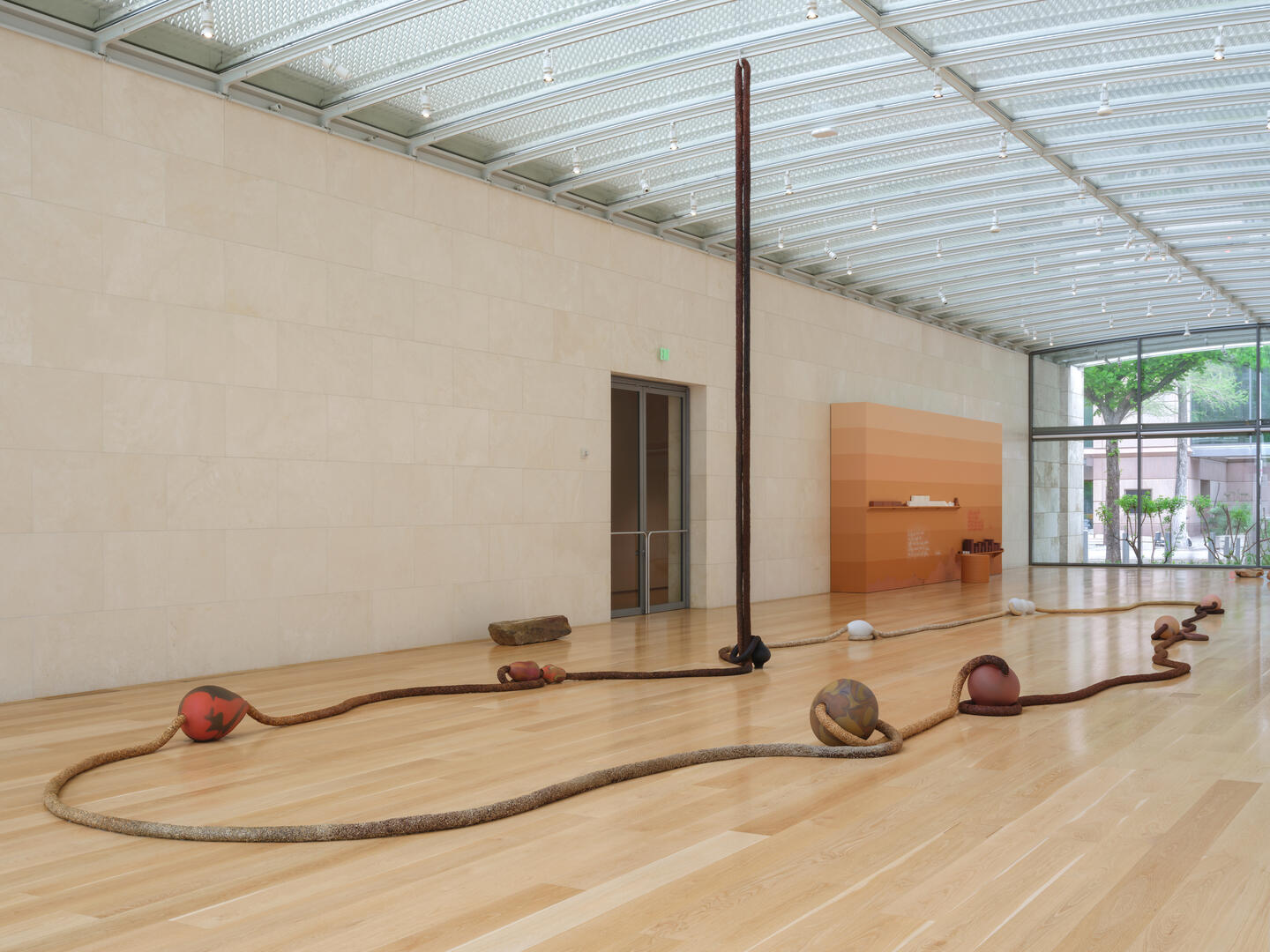 Installation view of 2025 Nasher Prize Laureate Otobong Nkanga: Each Seed a Body, Nasher Sculpture Center, Dallas, Texas, April 5, 2025 – August 17, 2025. © Otobong Nkanga. Photo by Kevin Todora, courtesy of Nasher Sculpture Center